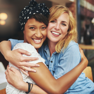 Two women hugging