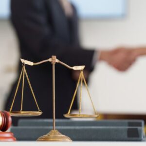 Legal image with lawyer and client shaking hands