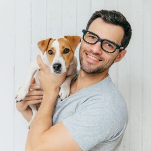 Man holding pet dog